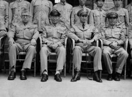 Chinese and American officers take a picture together in Nanjing (Nanking) at the time of the Japanese surrender there.  Left to right, front: Col. Bauville, Maj. General Lucas, General C. J. Chow (Zhou Zhirou; 周至柔), Brig. General J. P. McConnell.  In the CBI during WWII.