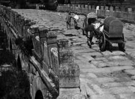 An imperial bridge (most likely built in the Qing Dynasty) somewhere in China during WWII.  Photo from Henry Herbert.