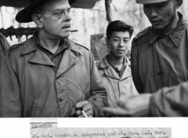 Lt. Col. Gordon S. Seagrave and Lt. Gen. L. J. Sun, Commanding General of Chinese 38th Div., are seen here discussing the health of a Chinese patient in Col. Seagrave's Ningam Sakan hospital unit. January, 1944.  Photo by T/5 Leipnitz.