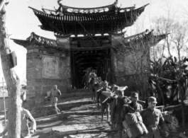 Chinese troops march through Mitu, Yunnan province, on their way to the battleground.  US Army Signal Corps photo.