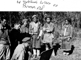 US Army Combat Artist Sgt. R. Zounes draws Lisu Burma Road worker on the Tengchong cutoff of Burma Road.  Photo by Syd Greenberg.