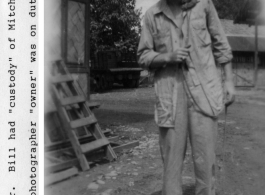 Bill Fowler with a monkey on his back, during WWII.