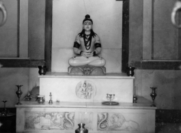 Statue of a deity in the Jain Temple, Calcutta, during WWII.  Photo from J. E. Thomas.