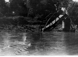 Destroyed bridge near the Myitkyina Road, Bhamo, Burma. In the CBI.  Photo by Jesse Newman