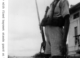 Armed Chinese guard at Wuchang Hospital during WWII.  Photo by Way.