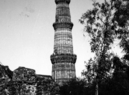 Qutub Minar tower, Delhi, during WWII.