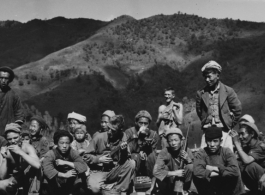 GIs play music and socialize with hill people in SW China during WWII.