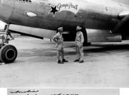 The B-29 bomber "Georgia Peach," with six camels painted on to count the number of times having flown over "The Hump." July 23, 1944. Major Seaton. Kharagpur, India, to China.