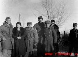 American GIs and a woman in the northern part of China, in cold weather. During WWII.