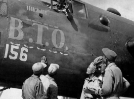 Chinese American Composite Wing (CACW) --Chinese pilot in the cockpit of the North American B-25 "B.T.O." give a "thumbs up" sign to other members of the Chinese and American Replacement Training Unit, prior to taking off on a mission. Karachi, India, during WWII.  Photo by 7th Photo Technician Squadron, 8th Reconnaissance Group.