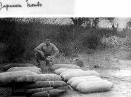 B0b Babinec in Lashio with some of the bombs that had been buried by the Japanese under village homes. During WWII.