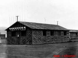 A building sprouting numerous radio antennas in the CBI during WWII.