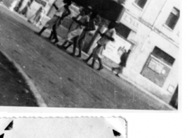 Personal delivery in Calcutta during WWII--several men carrying a large burden in 1944.  Photo from Harold E. Tibbs.