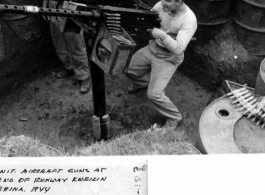 American men play with anti-aircraft machine guns at the end of a runway at Guilin (Kweilin), China, 1944.