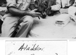 GI buying slippers in a shop in India, 1942.   Photo from Robert D. Lichty.