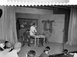 Various scenes from a variety show to entertain the troops in the CBI during WWII.  This particular images seems to be of a "Special Service Show in Kunming, China, Xmas 1944," and may have originally belonged to Addie Bailey.