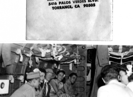 The whole USO troupe--Falkenberg, O'Brien, and Keaton--with attentive GIs on a transport plane in the CBI during WWII.  Image provided by Emery and Beth Vrana.