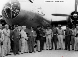 VIPs welcome first B-29 bomber, "K-45" to arrive in China during WWII--Major General Claire Chennault and Brigadier General LaVerne Saunders #6 & 8 from right.