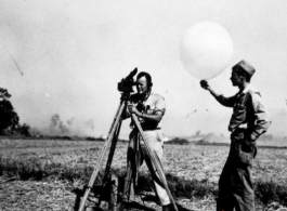 A cameraman shoots movie footages in the CBI during WWII.  Dale Flinders.