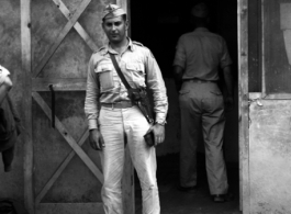 David Firman was a member of the 61st Air Service Group. Here he is standing at Hsinching, China.  10th Army Air Force.