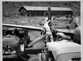 A P-38 under maintenance and fueling at a base in Guangxi province in 1944, most likely a base at Guilin. August 2, 1944.