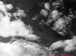 B-25 Mitchell bombers in flight in the CBI near an American air base, in the area of southern China, Indochina, or Burma. During WWII.