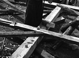 Wood workers building roof trusses on an American base in Yunnan, during WWII.