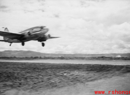 A C-46 cargo plane at an American air base in WWII in Yunnan province, China, most likely around the Luliang air base area.