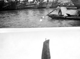 Boats on a river, possibly Whangpoo River, in Shanghai, China, during WWII.