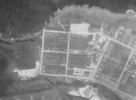 Aerial photograph of a base, possibly Allied, during WWII.