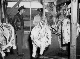 Inspection at a beef slaughterhouse at Yangkai, set up specifically to provide meat for base personnel. During WWII.