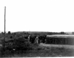 Burial ceremony at the temporary American military graveyard outside of Kunming, Yunnan, China. 