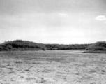 A P-51 fighter in a revetment somewhere in China.  Image from U. S. Government official sources. 