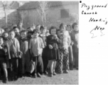 Kids play on playground at Presbyterian Church. Nanjing, November 1945.