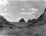 Grass hill between karst peaks in our around Liuzhou city, Guangxi province, China, in 1945.