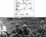 T/Sgt. Syd Greenberg, Combat Photographer, interacts with a Chinese soldier on the trail towards the Salween River. "7th day out and still walking up hill."  May 20, 1944.  Photo by Cpl. Hedge.