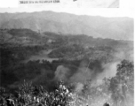 American troops of the 2nd Battalion, 279th Regiment, use a machine gun to fire upon Japanese positions on the Burma Road, at Loi Kang Burma. January 26, 1945.   Photo by Colgate.