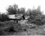 A village scene in India, with a small child in the middle.  Local images provided to Ex-CBI Roundup by "P. Noel" showing local people and scenes around Misamari, India.    In the CBI during WWII.