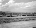 Local women drying laundry on bushes near Yangkai, Yunnan province, China, during WWII.