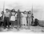 Pat O'Brien and his USO troupe perform at an American airbase in China in October 1944. Left to right they are Jimmy Dodd, Jinx Falkenberg, Pat O'Brien, Ruth Carrol and Betty Yeaton.  From the collection of Elmer Bukey.