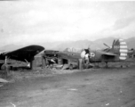 "This is a picture of one of the eight P-40's that was built from our salvage yard at Kwelin (Guilin) China. The planes had new engines installed and were tested and turned over to the fighter groups for combat service.To our knowledge all planes performed to everyone's satisfaction." Caption courtesy of Elmer Bukey.