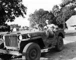 David Firman, 61st Air Service Group, at the wheels of a jeep nicknamed "Pee Wee"  in the CBI during WWII.  From the collection of David Firman, 61st Air Service Group.