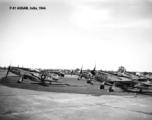 Numerous P-51s lined at Assam, India, 1944, including serials #473932, and #415582.