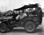 A GI in an jeep in India during WWII.  From the collection of David Firman, 61st Air Service Group.