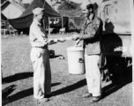 Major Claude R. Hannah and 1st/Sgt. Klein interact at a camp in India during WWII.   From the collection of David Firman, 61st Air Service Group.