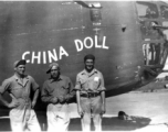 Four US servicemen in front of the B-24 "China Doll".  Note the fourth face in the small port above, labeled "Tiff".   From the collection of Robert H. Zolbe.