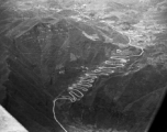 Aerial view of road in western Guizhou province, with famous multiple turns. During WWII.