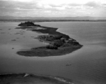 View over Dianchi Lake (滇池) outside of Kunming, China, during WWII. A few small boats dot the water surface. 