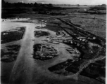 L-6s, and other planes at the Liuzhou (Liuchow) air base during the summer or fall of 1945. Rows of tents are on the right. The distinct karst mountains of the area are visible in the background.  Photos taken by Robert F. Riese in or around Liuzhou city, Guangxi province, China, in 1945.