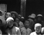 People in northern China pose at a transport company facility in northern China during WWII.